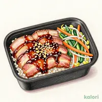 炭火焼風にんにくだれの豚カルビ重（麦入ごはん）